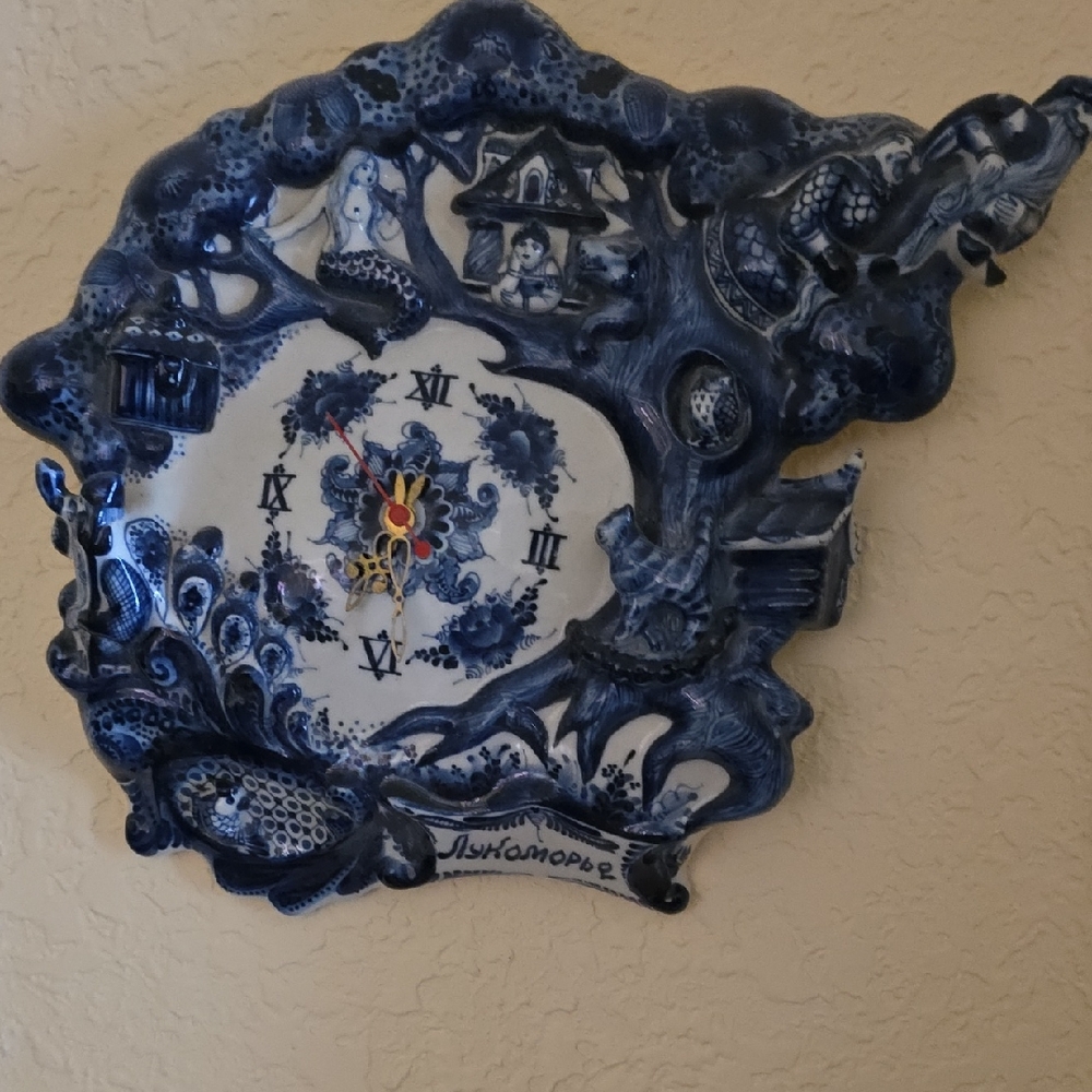 Intricate Blue and White Ceramic Wall Clock